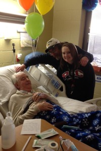 A picture of my daughter Haley, Dad and me, in acute Rehab